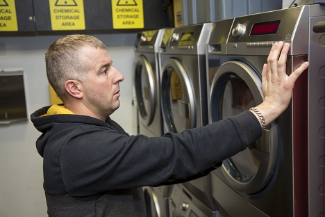 Footballer Using Washing Machine